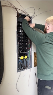 Tech works on a panel