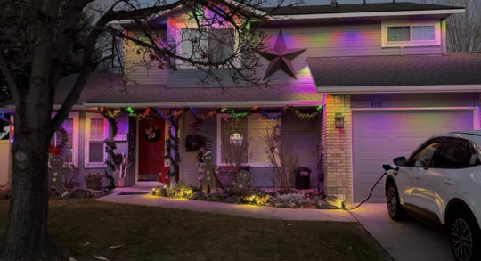 Home with permanent outdoor lighting